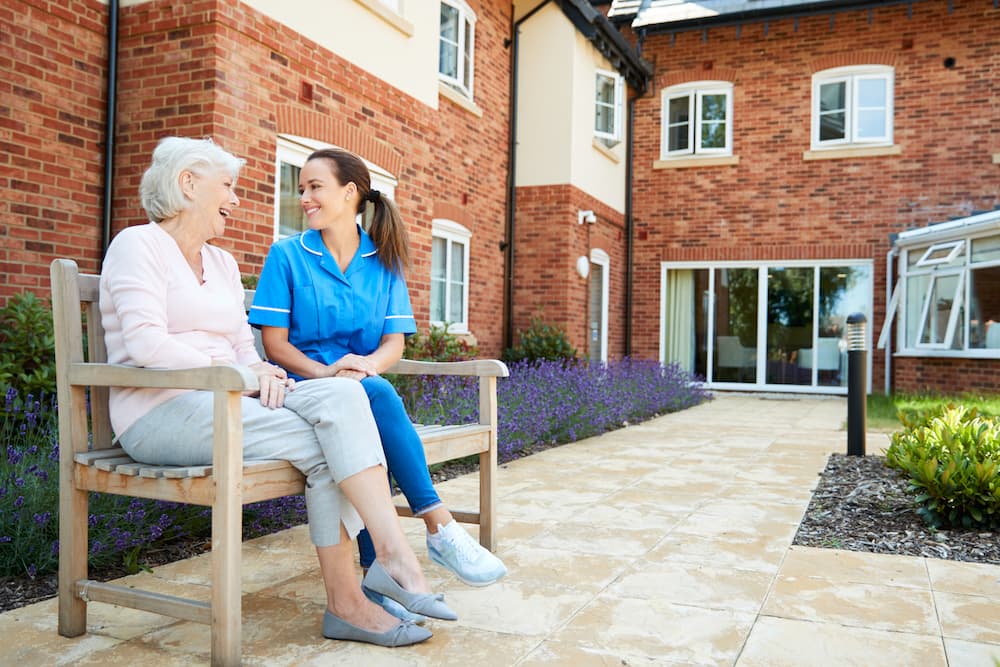 assisted living resident in outdoor campus